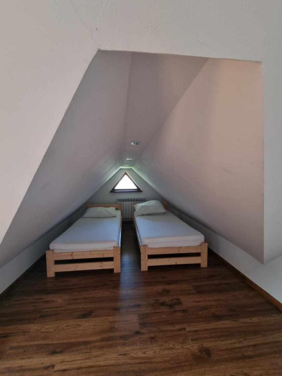 Postel nebo postele na pokoji v ubytování Willa Gazda