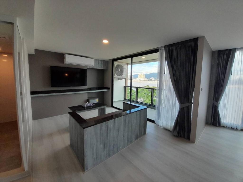 Kuchyň nebo kuchyňský kout v ubytování วัน บัดเจท เชียงราย เชียงแสน One Budget Hotel Chiangrai Chiangsaen