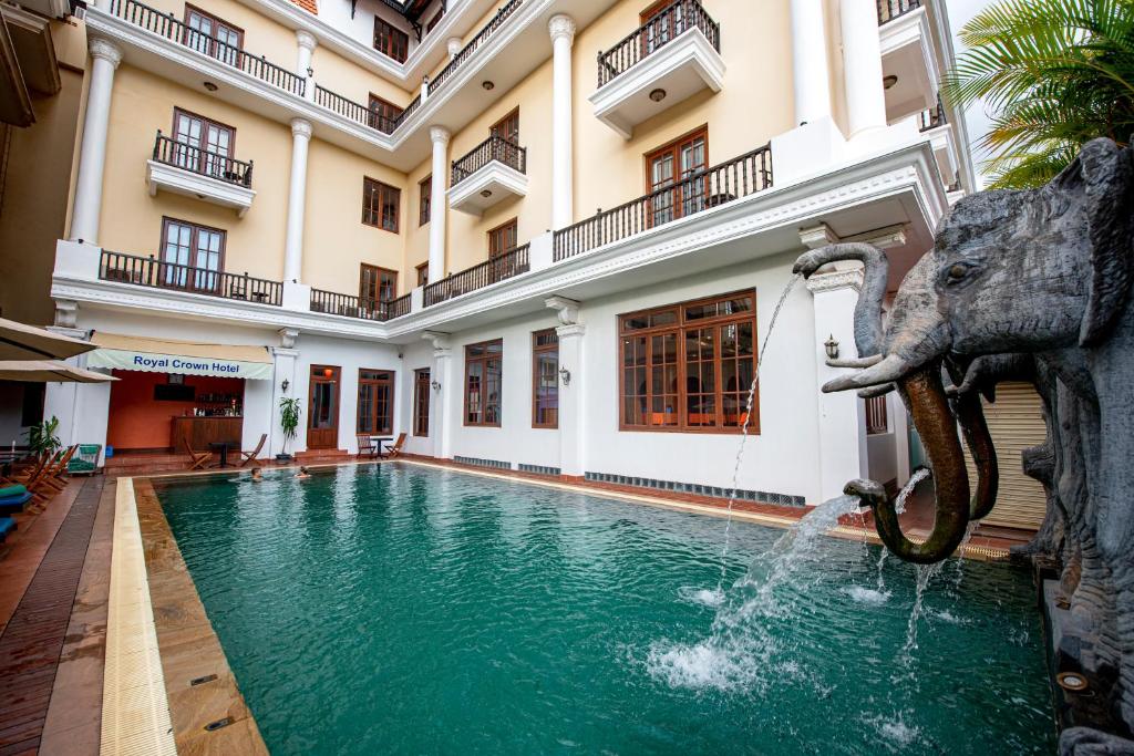 an elephant spraying water from a fountain in a building at Royal Crown Hotel & Spa in Siem Reap