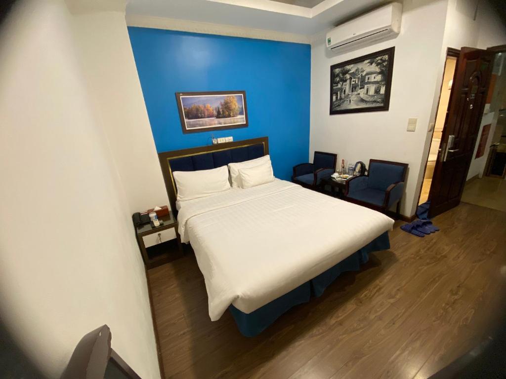 Postel nebo postele na pokoji v ubytování A25 Hotel - 61 Lương Ngọc Quyến