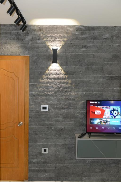 TV a/nebo společenská místnost v ubytování SUNLIGHT