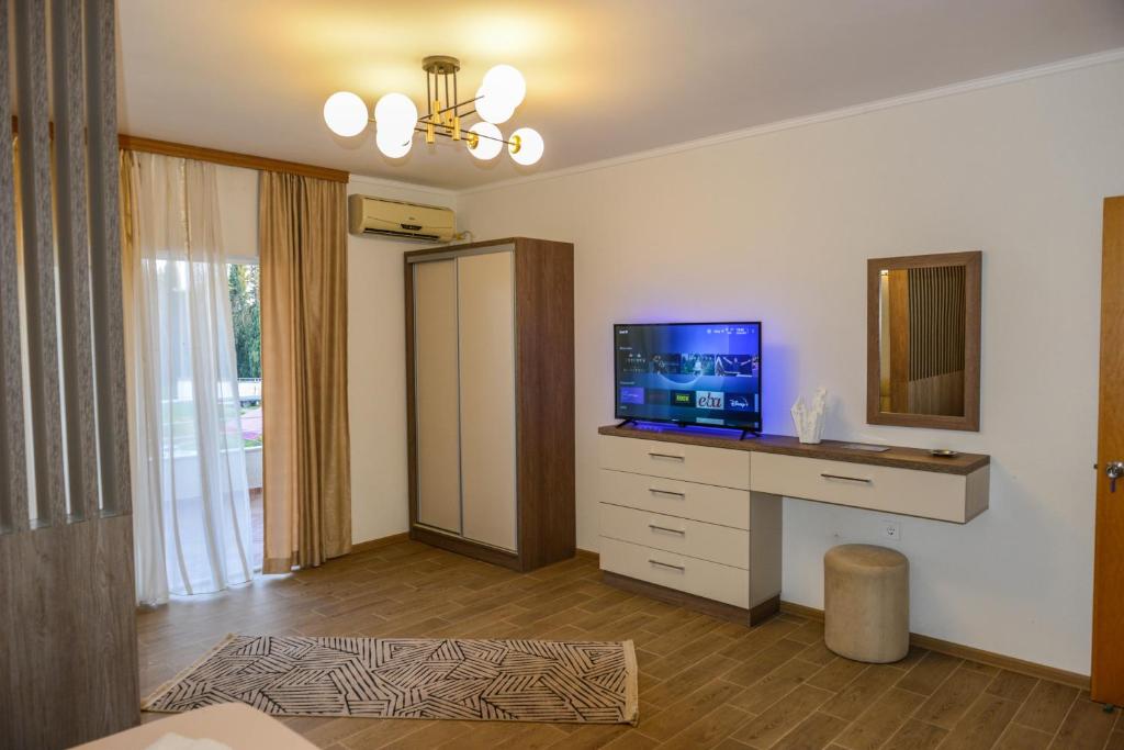 TV a/nebo společenská místnost v ubytování SUNLIGHT