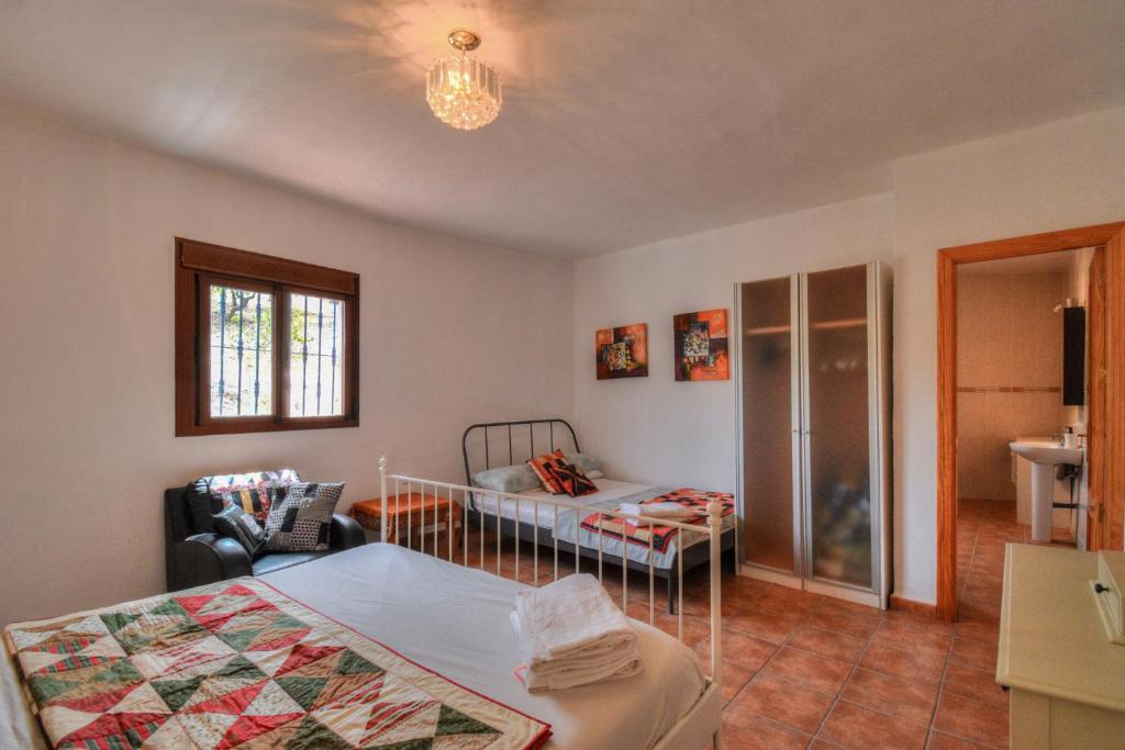 Posteľ alebo postele v izbe v ubytovaní Casa Redonda