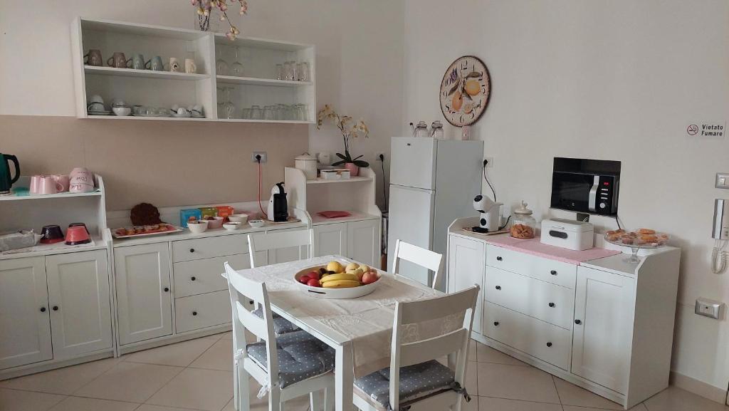 Kuchyňa alebo kuchynka v ubytovaní B&B La Perla Bianca