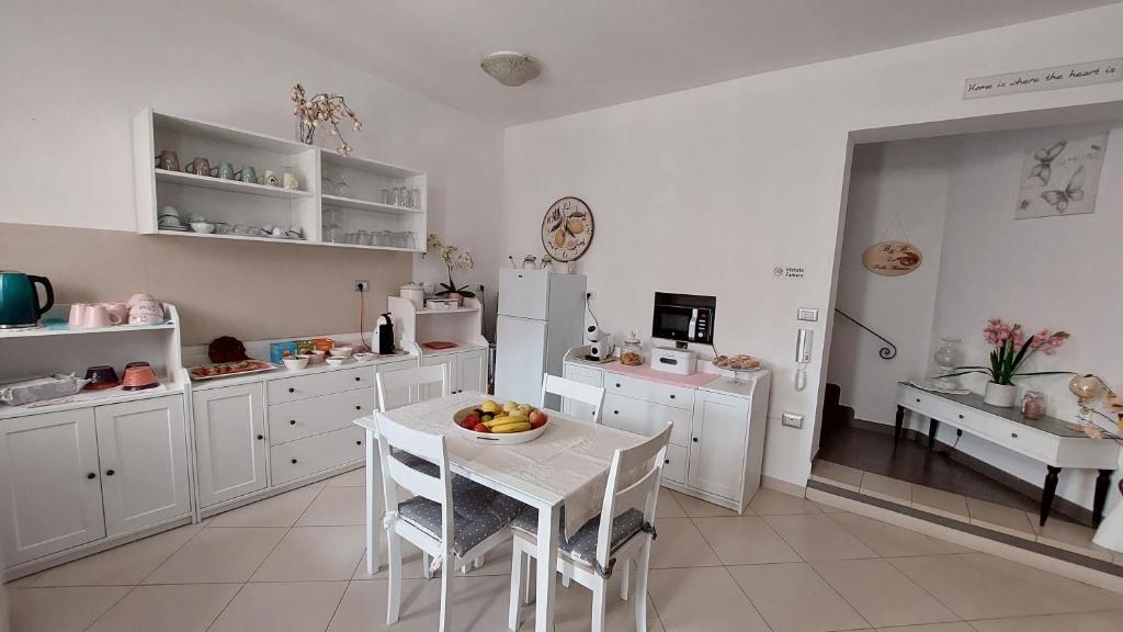 Kuchyňa alebo kuchynka v ubytovaní B&B La Perla Bianca