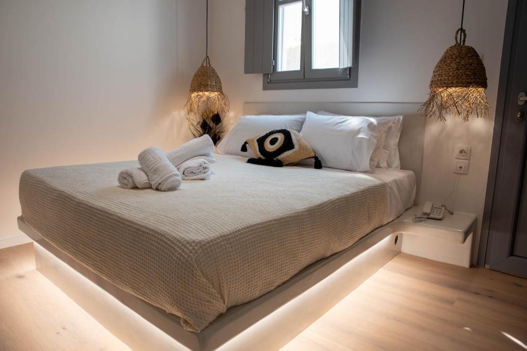 Postel nebo postele na pokoji v ubytování Aidani Luxurious Rooms