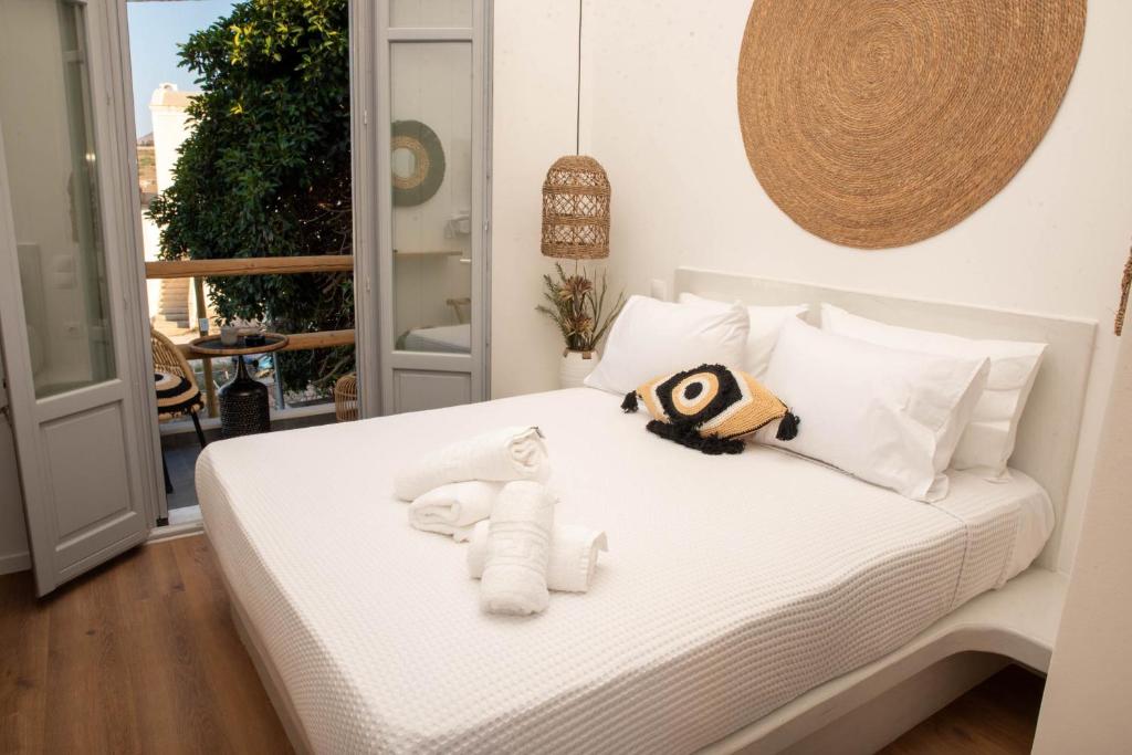 Postel nebo postele na pokoji v ubytování Aidani Luxurious Rooms