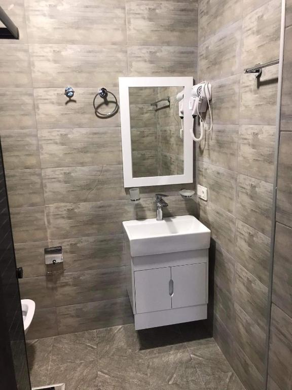 Koupelna v ubytování Hotel Niko