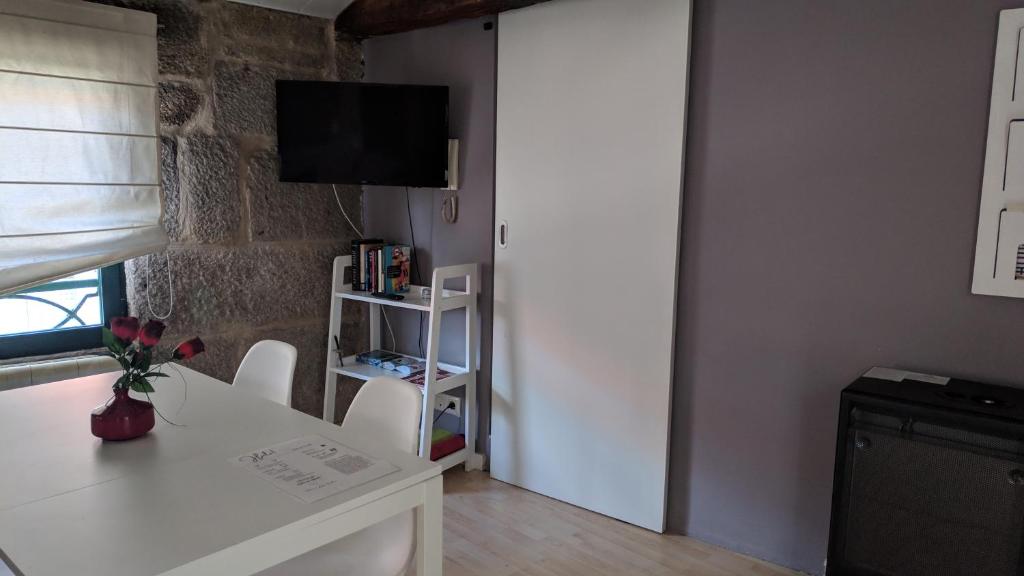 TV a/nebo společenská místnost v ubytování Loft en el camino