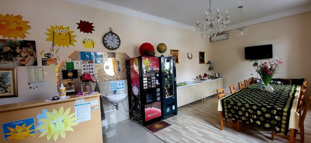 TV a/nebo společenská místnost v ubytování Hostel Sonce