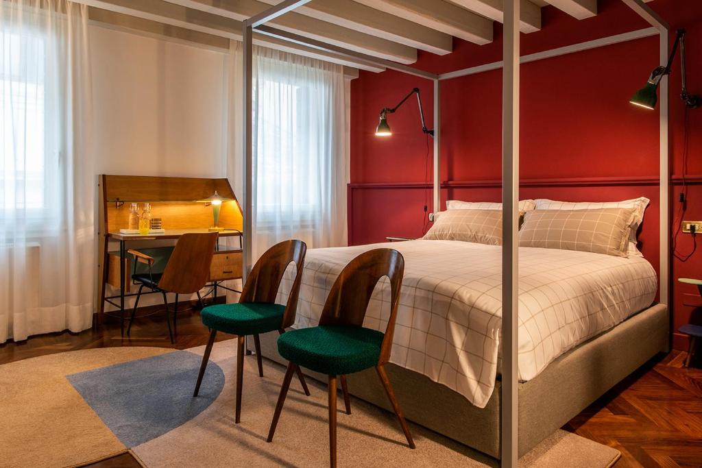 Postel nebo postele na pokoji v ubytování Casa Giotto