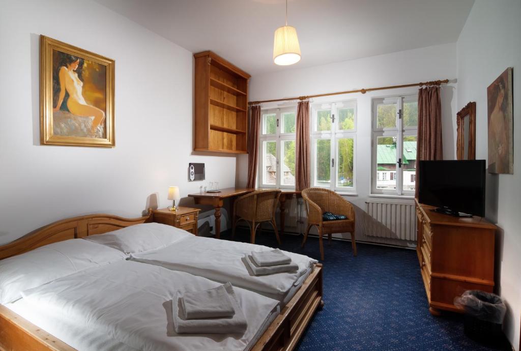 Postel nebo postele na pokoji v ubytování Depandance Villa Hubertus