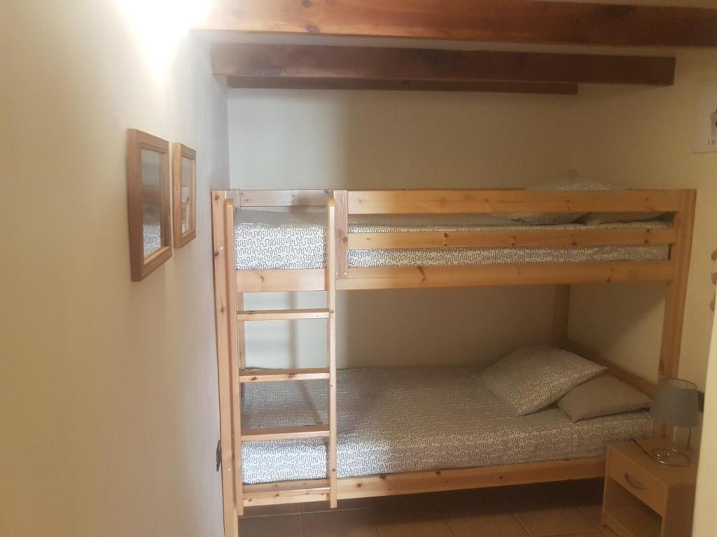 Posteľ alebo postele v izbe v ubytovaní Medano Loft