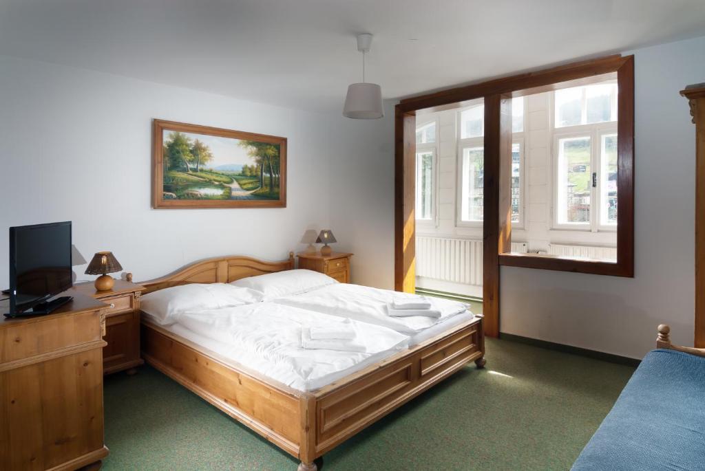 Postel nebo postele na pokoji v ubytování Depandance Villa Hubertus