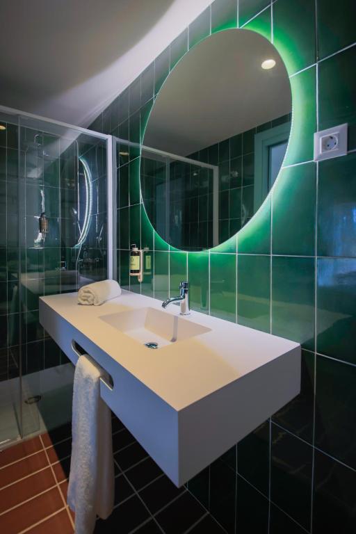 Koupelna v ubytování Terra Aurea Aparthotel