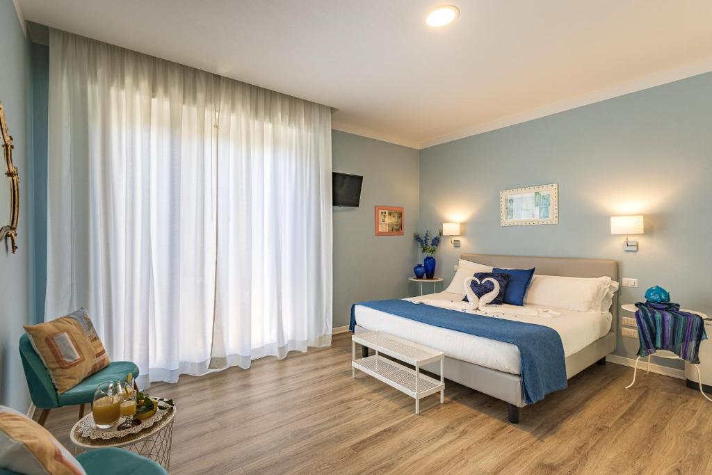 Posteľ alebo postele v izbe v ubytovaní B&B La Cornice