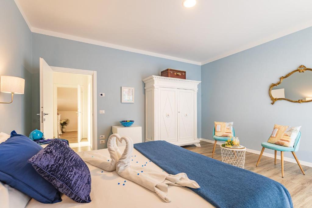 Posteľ alebo postele v izbe v ubytovaní B&B La Cornice