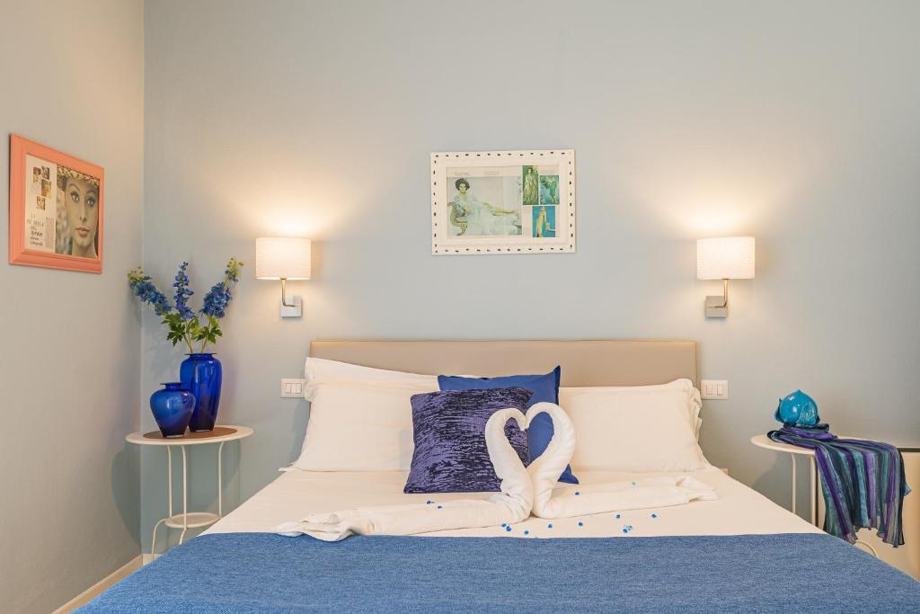 Posteľ alebo postele v izbe v ubytovaní B&B La Cornice