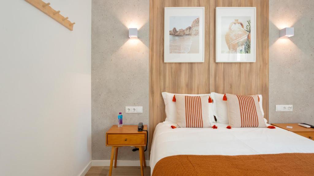 Postel nebo postele na pokoji v ubytování Hotel Made inn Faro