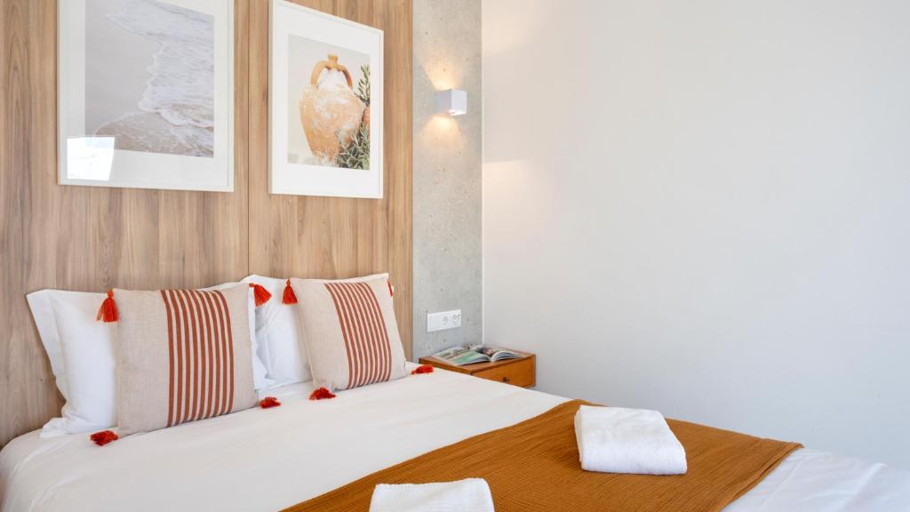 Postel nebo postele na pokoji v ubytování Hotel Made inn Faro