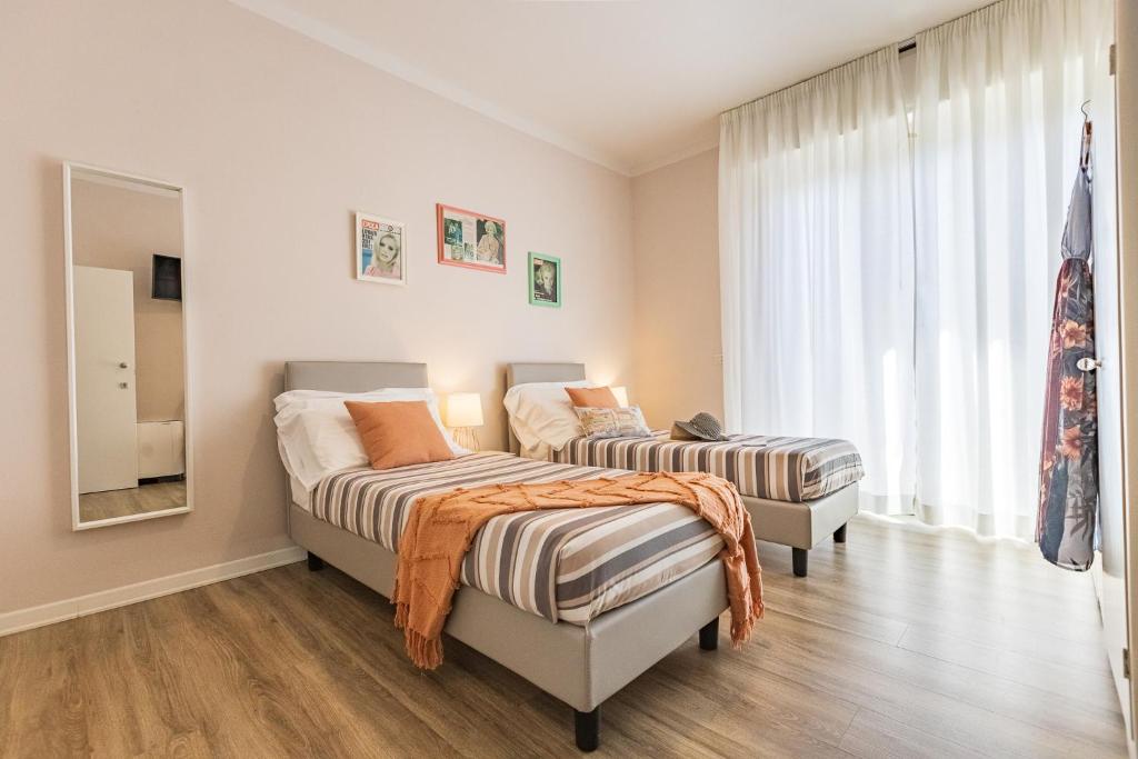 Posteľ alebo postele v izbe v ubytovaní B&B La Cornice