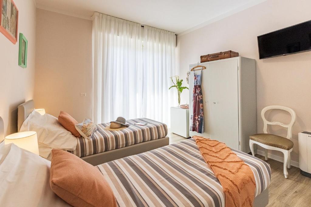 Posteľ alebo postele v izbe v ubytovaní B&B La Cornice