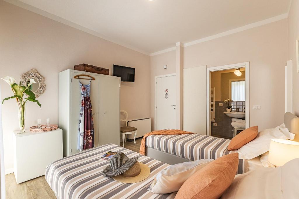 Posteľ alebo postele v izbe v ubytovaní B&B La Cornice