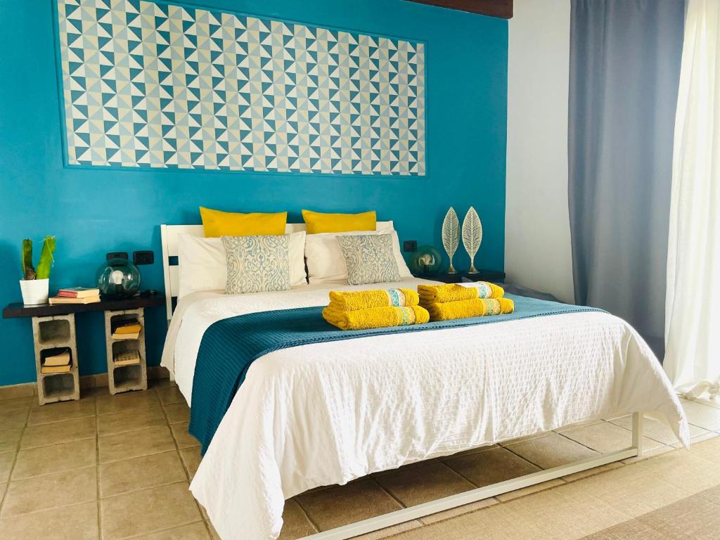 Postel nebo postele na pokoji v ubytování Kalufa Surf House