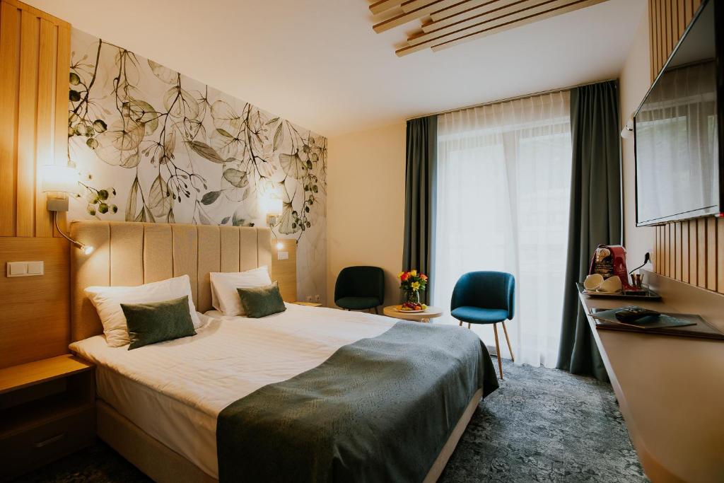 Postel nebo postele na pokoji v ubytování Hotel O3zone
