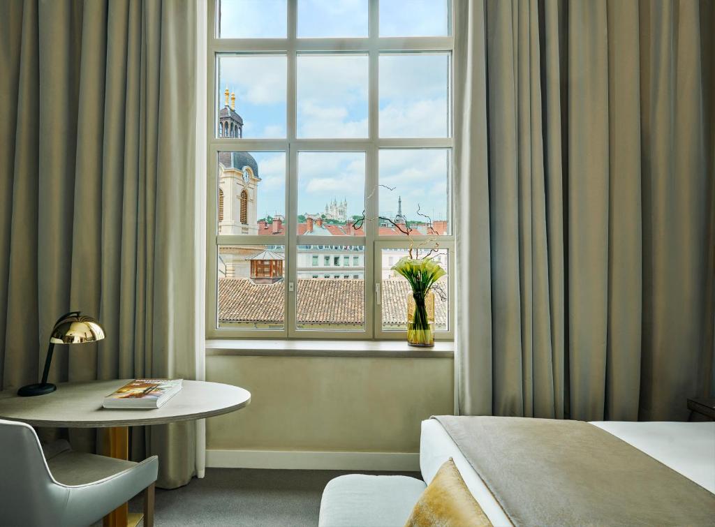 Postel nebo postele na pokoji v ubytování InterContinental Lyon - Hotel Dieu by IHG