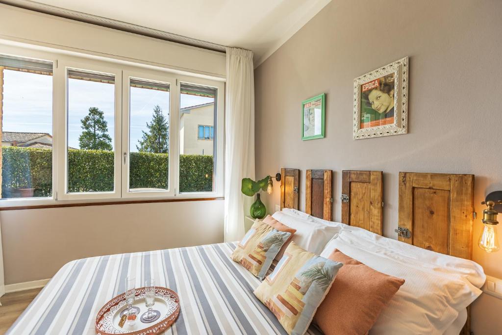 Posteľ alebo postele v izbe v ubytovaní B&B La Cornice