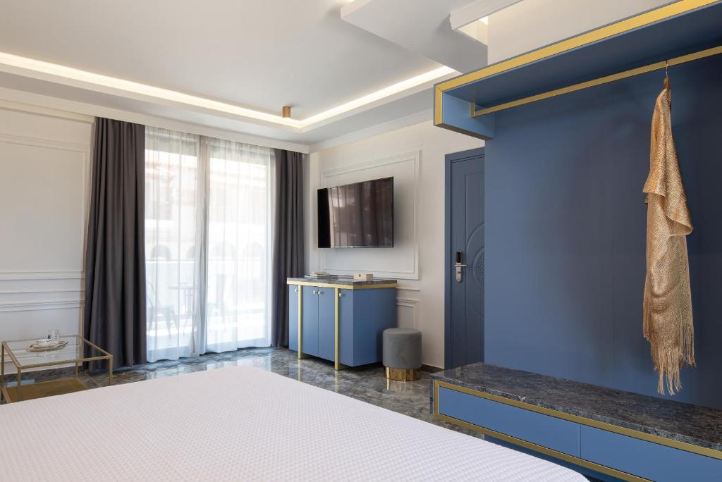 TV a/nebo společenská místnost v ubytování Acropol Golden Suites