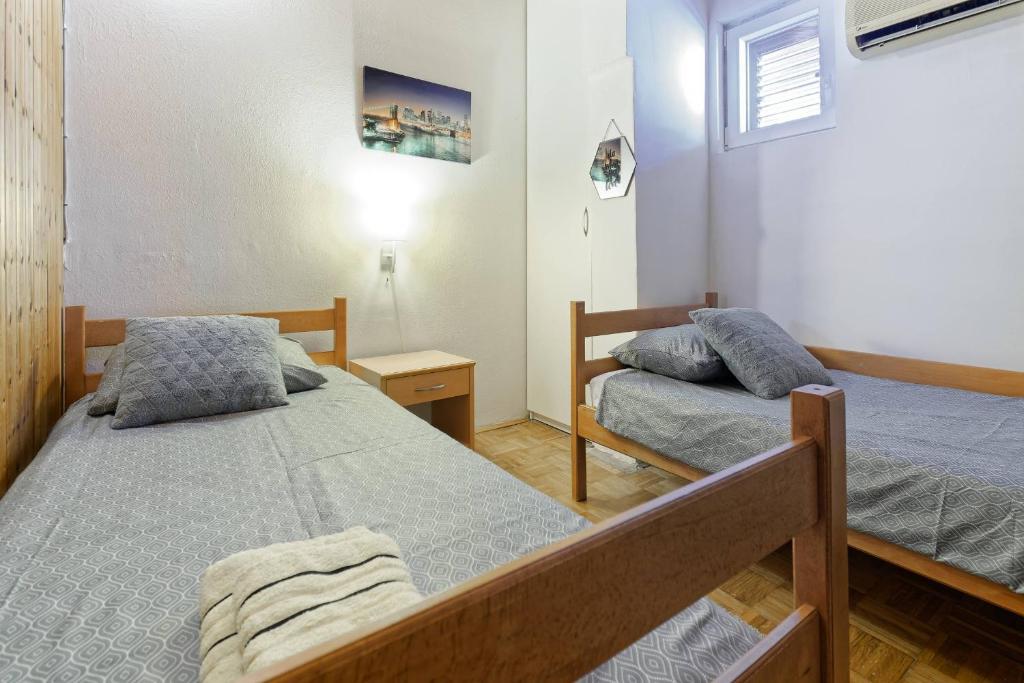 Postel nebo postele na pokoji v ubytování Apartment Chiara