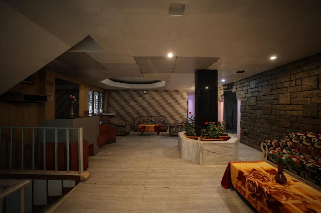 Uma área de estar em Jayaraj Residency