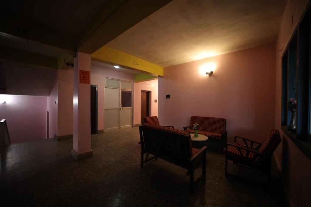 Uma área de estar em Jayaraj Residency