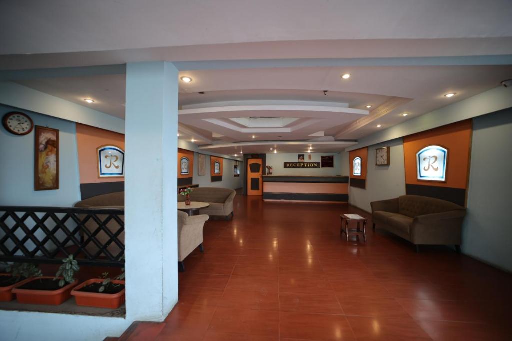 Uma área de estar em Jayaraj Residency