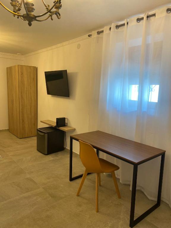 TV a/nebo společenská místnost v ubytování Suites Benalup Centro