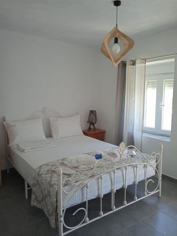 Postel nebo postele na pokoji v ubytování Crystal Villa