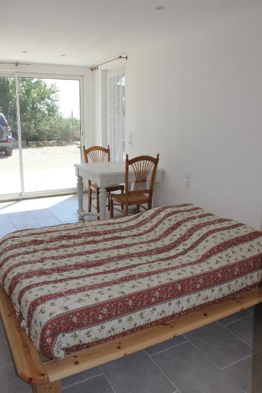 Postel nebo postele na pokoji v ubytování Soleil De Camargue
