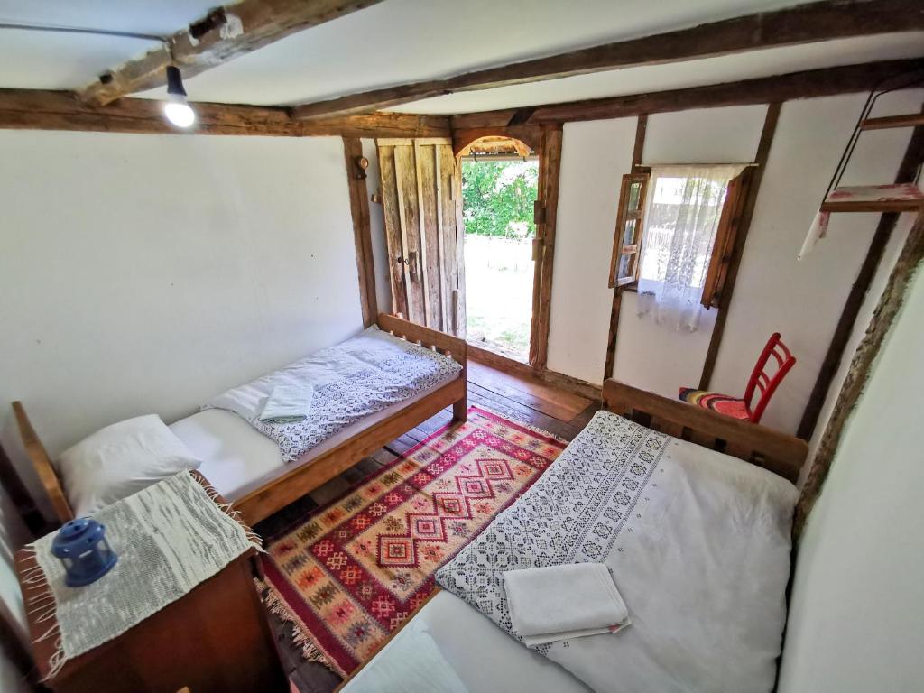 Postel nebo postele na pokoji v ubytování Etno Selo Dodig