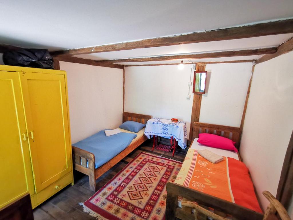 Postel nebo postele na pokoji v ubytování Etno Selo Dodig