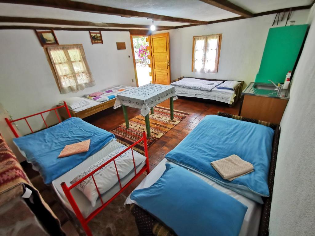 Postel nebo postele na pokoji v ubytování Etno Selo Dodig