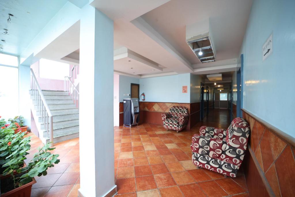 Uma área de estar em Jayaraj Residency