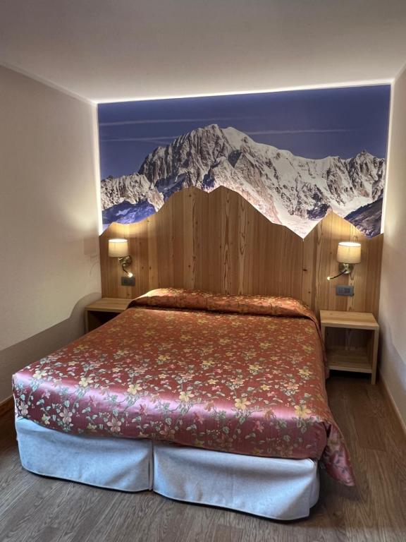 Postel nebo postele na pokoji v ubytování Hotel Des Glaciers