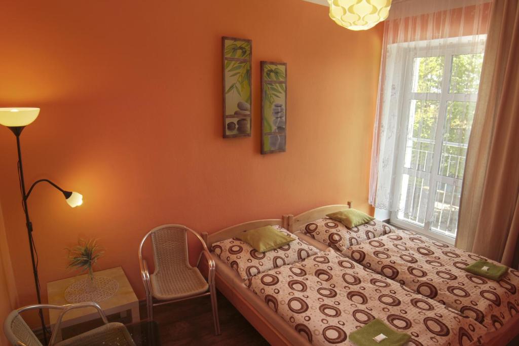 Postel nebo postele na pokoji v ubytování Hotel Pod Stráží
