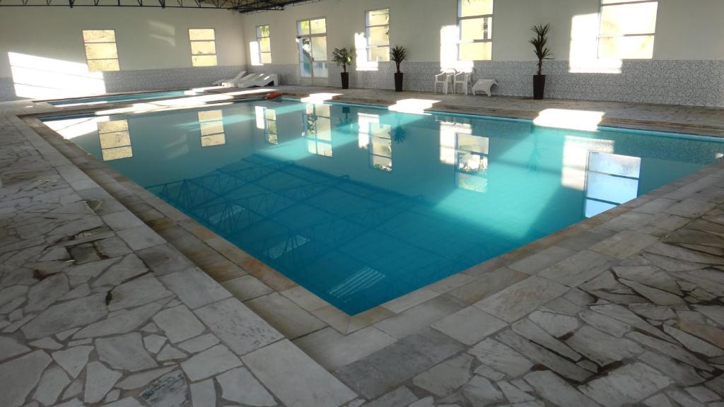 Bazén v ubytování Hotel Fazenda São Matheus nebo v jeho okolí