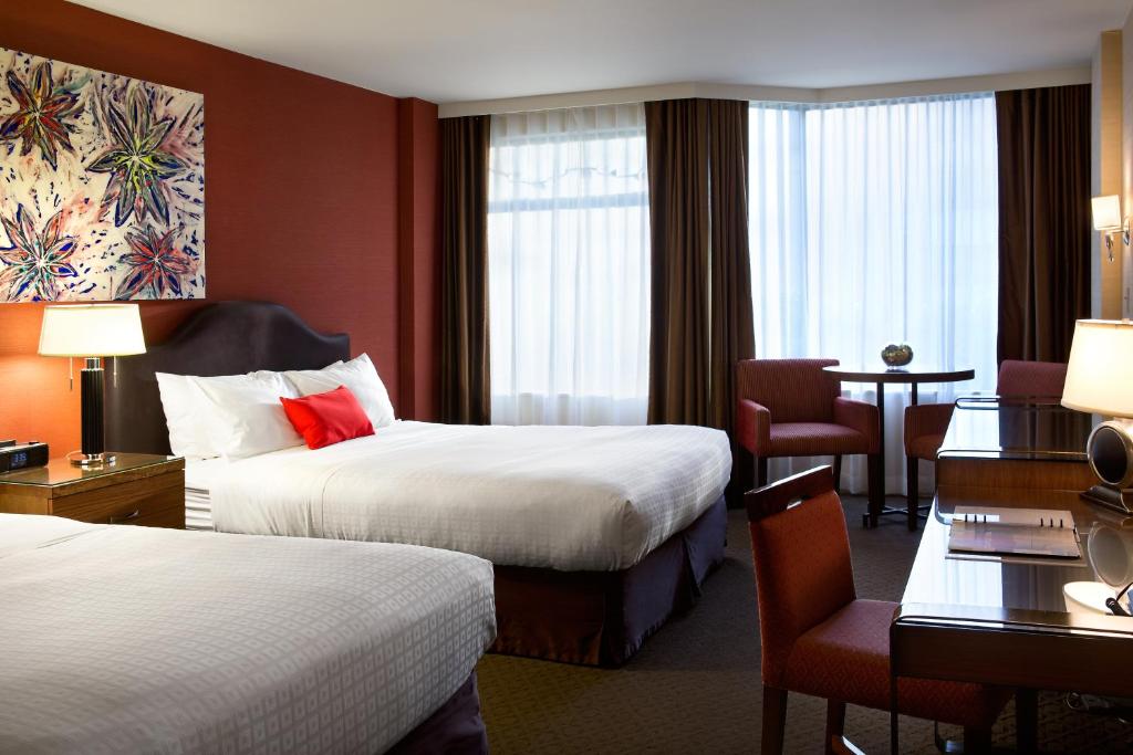 Krevet ili kreveti u jedinici u objektu The Listel Hotel Vancouver