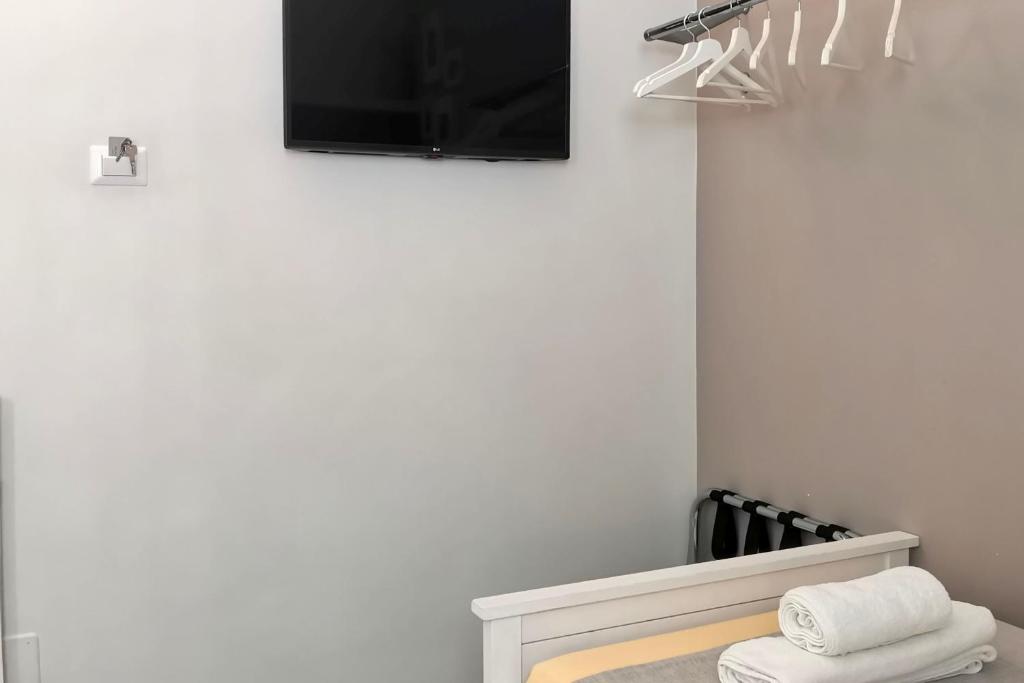 TV a/nebo společenská místnost v ubytování Vicolo Fiore Affittacamere