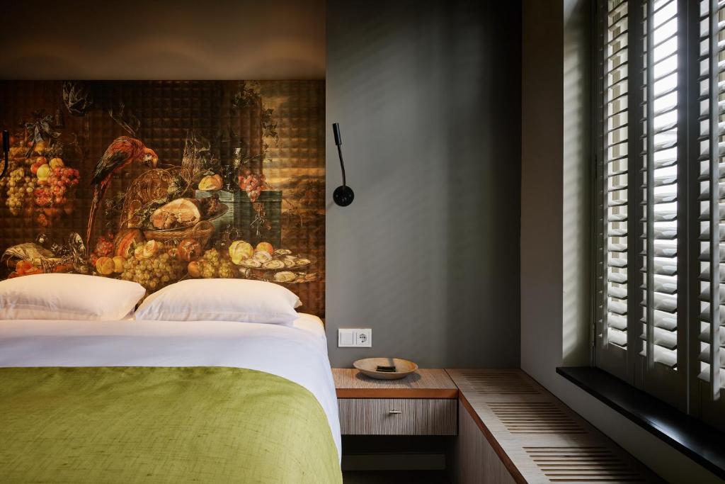 Postel nebo postele na pokoji v ubytování Hotel Miss Blanche