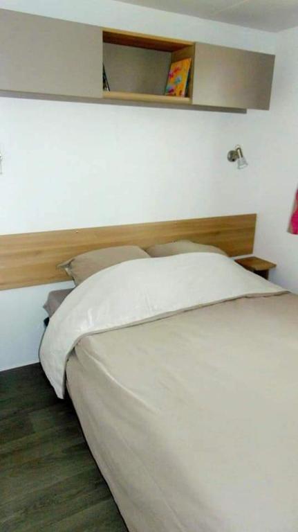 Postel nebo postele na pokoji v ubytování Mobilhome Canet-en-Roussillon